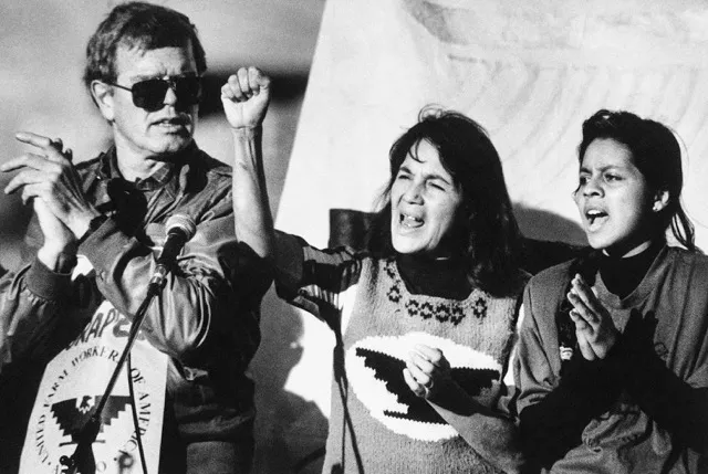 Dolores Huerta at UFW Rally Dolores Huerta farmworker rights. United Farm Workers leader Dolores Huerta, center, leads a rally with Howard Wallace, president of the San Francisco chapter of the UFW, left, and Maria Elena Chavez, 16, daughter of Cesar Chavez, right, in San Francisco’s Mission District as part of a national boycott protesting what the UFW describes as the dangerous use of pesticides on table grapes on Nov. 19, 1988. Credit: Photo by Court Mast, AP