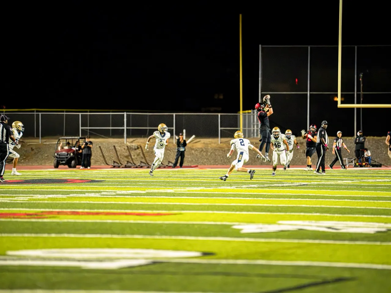Murrieta Valley Wide Receiver, Kayden Borden (4) takes a big leap for a catch downfield for a huge gain.