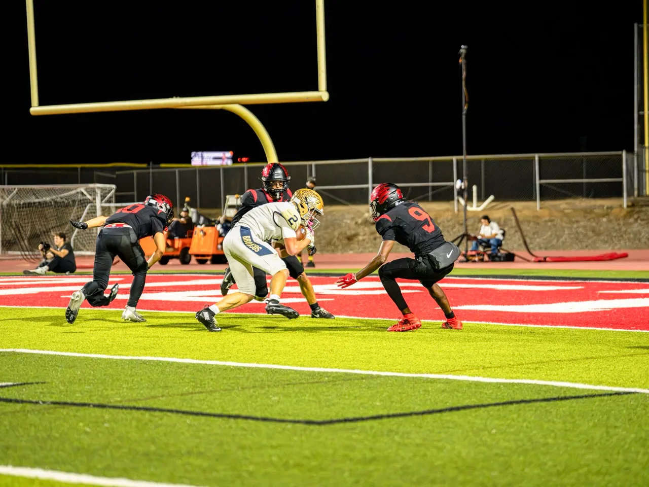 Vista Murrieta Wide Receiver, Brock Norman (2), powers through two defenders for a touchdown.